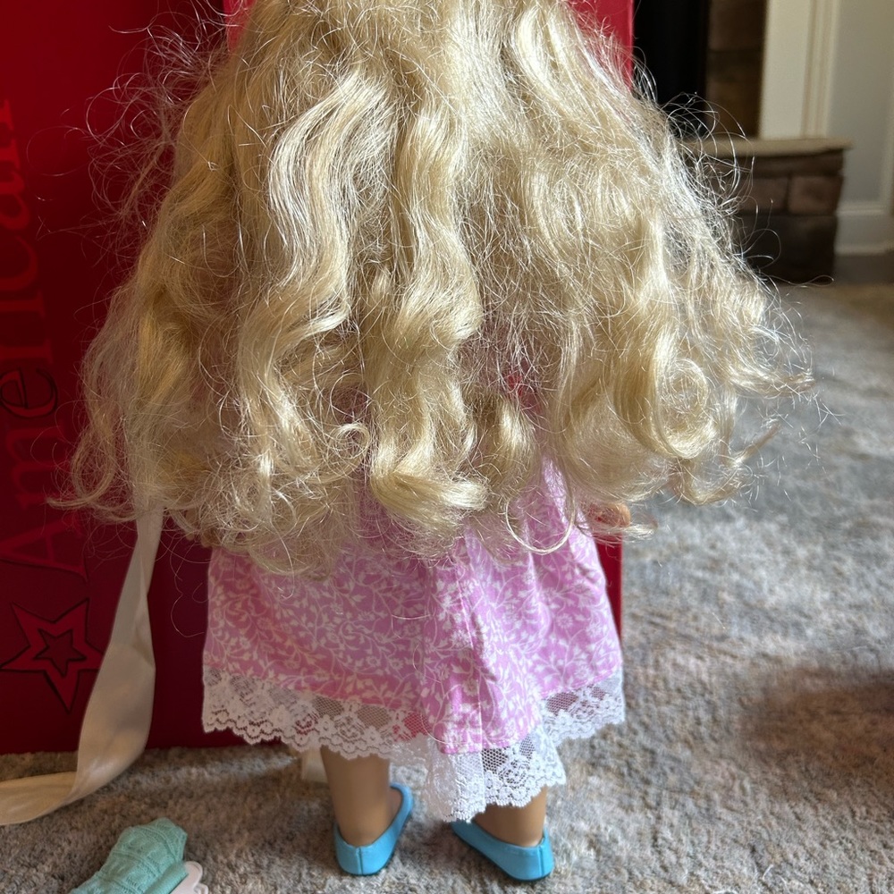 This Caroline American doll is barely used and in perfect condition except hair.